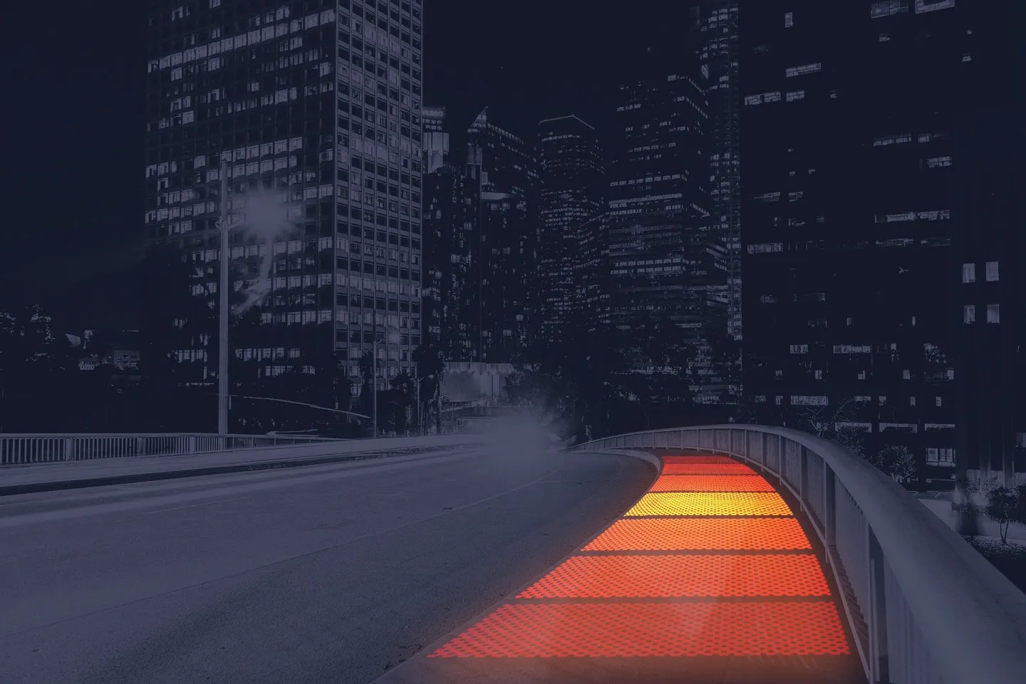 A footbridge with heated walkway panels