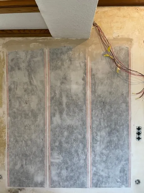 ComfortScrim fitted in three bays to the old wall before plastering