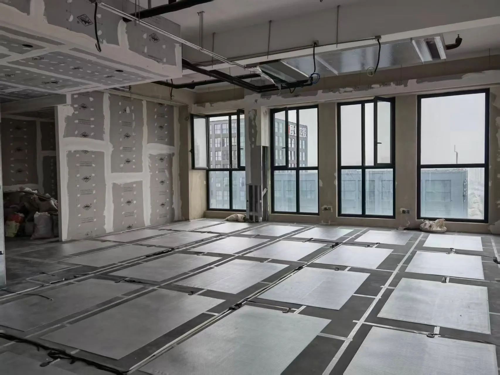 SafeTech EGS heaters laid out across an open-plan office floor