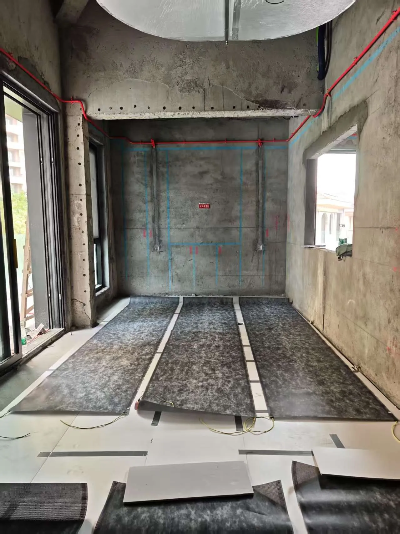 ComfortScrim running the length of a floor with its bus bars taped down