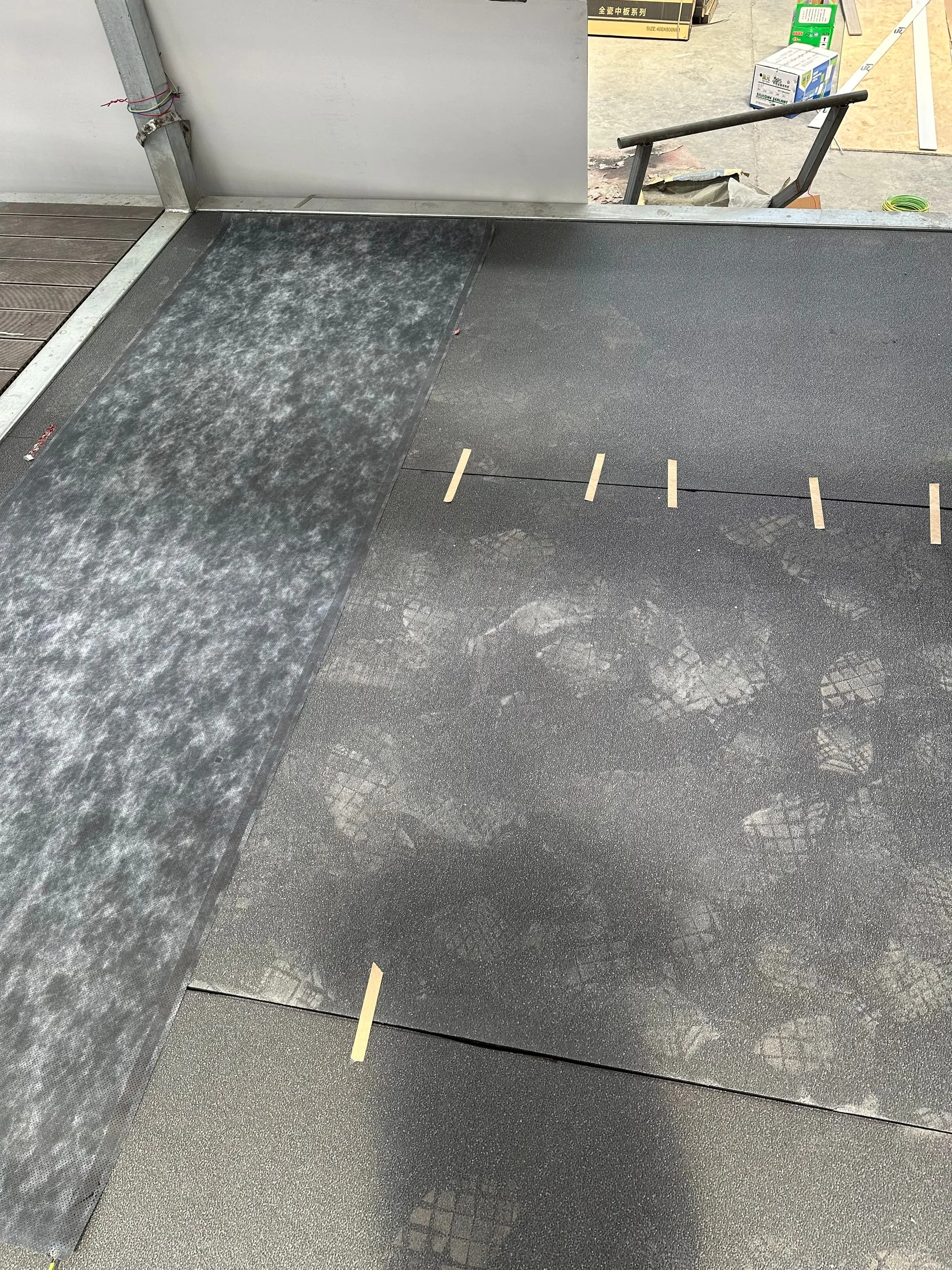 A floor fully covered with ComfortScrim before the levelling compound