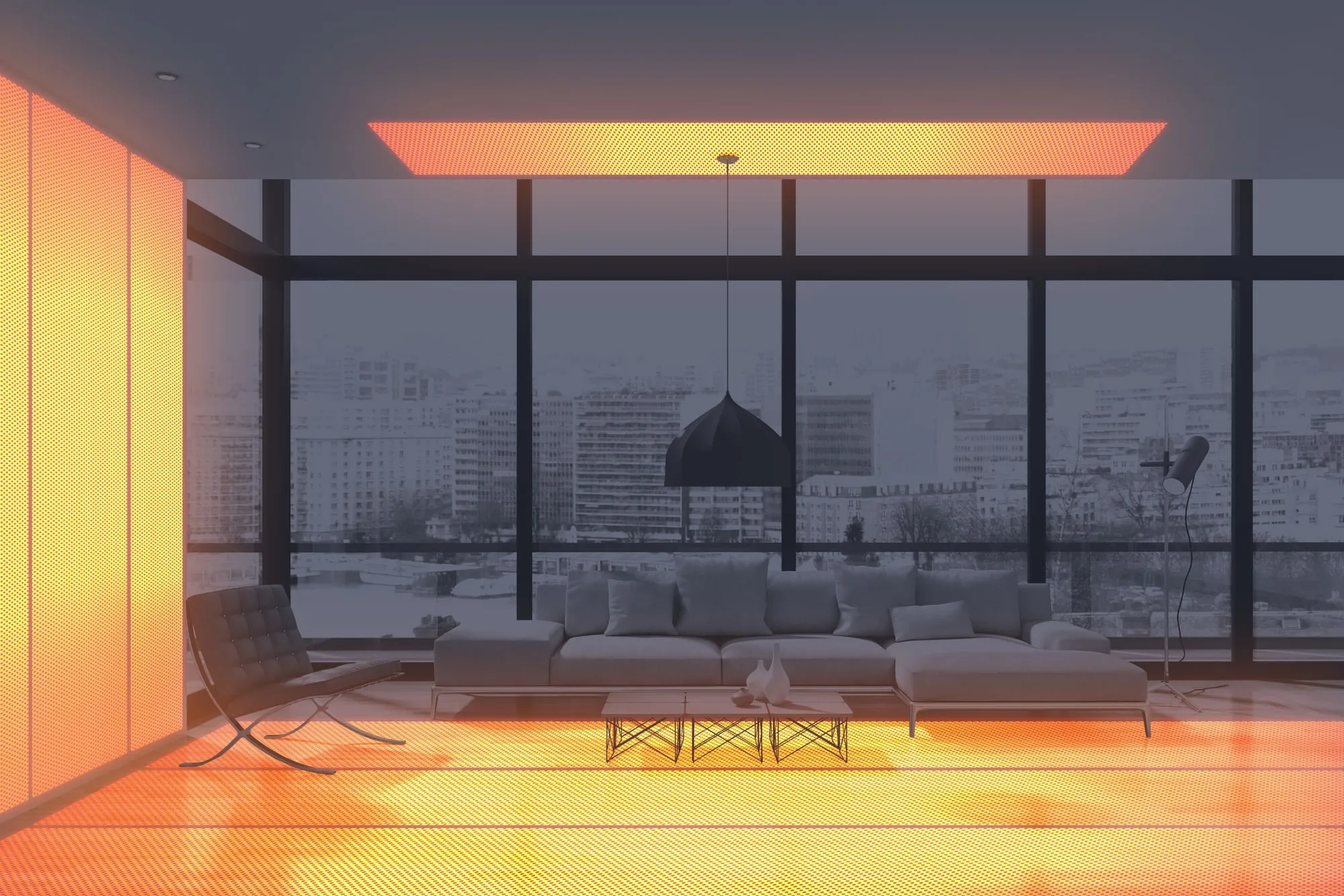 A living room with glowing heat in the floor, a wall and a ceiling panel, in front of a wall of windows looking out on a winter city