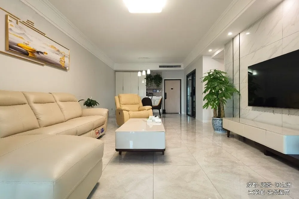 A finished living room heated by infrared, with no heaters visible on the walls or the ceiling