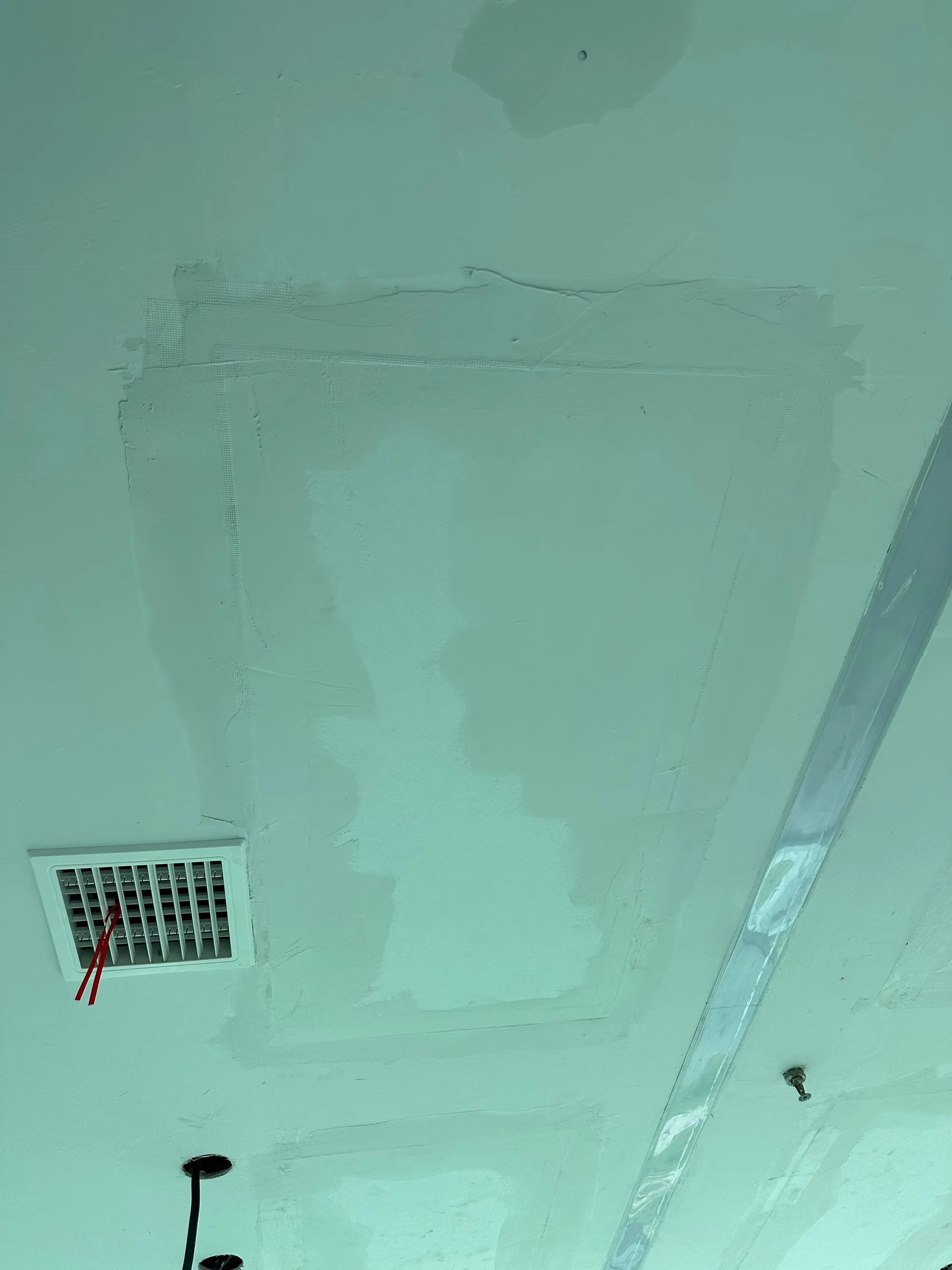 A PowerBoard 250 taped and jointed into the ceiling before painting
